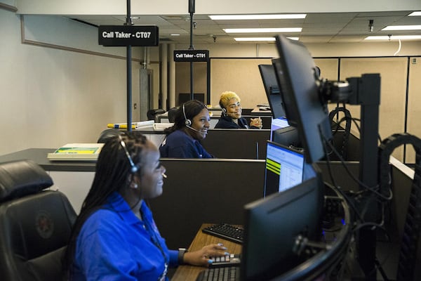 Call takers at the Fulton County Emergency Communications office handle 9-1-1 calls from much of south Fulton, including the cities of Fairburn, South Fulton, Union City, Chattahoochee Hills and Palmetto. Grady handles calls from the cities of East Point and College Park, also in the south Fulton region. (Alyssa Pointer/alyssa.pointer@ajc.com)