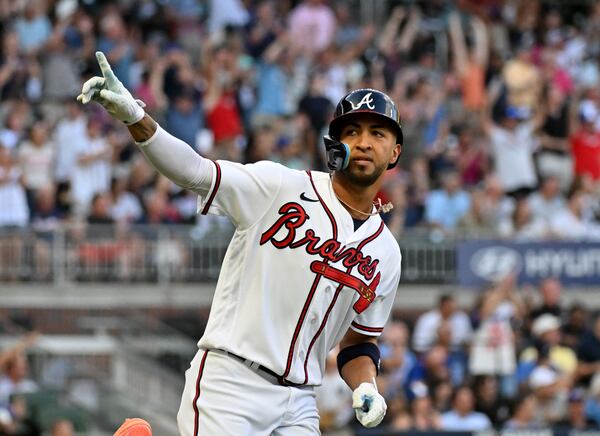 Atlanta Braves' left fielder Eddie Rosario (8) hits a 2-run home run during the second inning at Truist Park, Wednesday, August 16, 2023, in Atlanta. (Hyosub Shin / Hyosub.Shin@ajc.com)