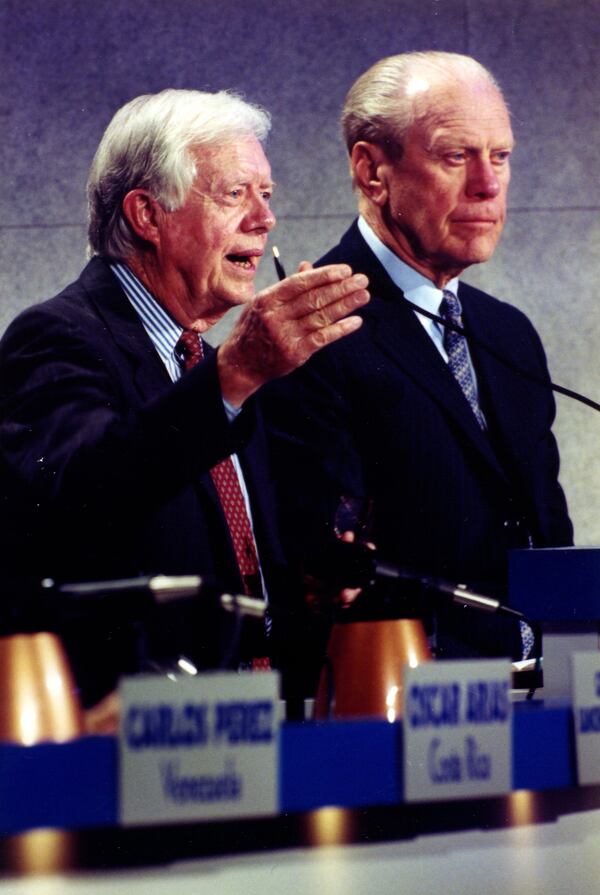 A team of (former) rivals: Historians said Jimmy Carter and Gerald Ford’s relationship was as close as any former presidents since John Adams and Thomas Jefferson. Here they took part together in a 1997 conference at the Carter Center in Atlanta. ROBERTO SCHMIDT / Agence France-Presse