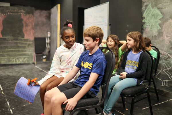 Elementary school students give a sneak peak at their play during a "school break play days” at the Alliance Theatre, Tuesday, Nov. 7, 2023, in Atlanta. Several Atlanta organizations have started to offer "camps" for kids when school is out and parents have to work. (Jason Getz / Jason.Getz@ajc.com)