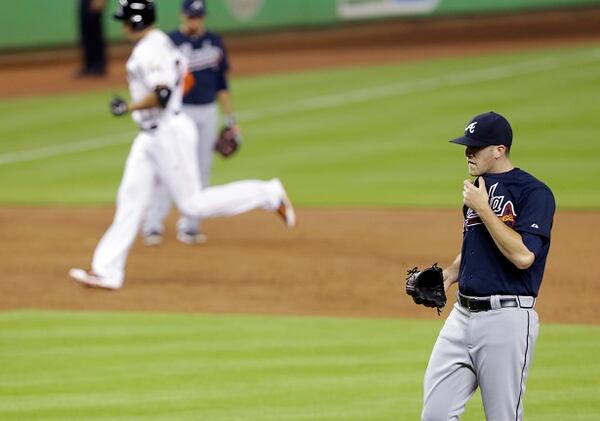 Miami Marlins' Giancarlo Stanton (27) rounds the bases after hitting a two-run home run off Atlanta Braves starting pitcher Alex Wood, right, during the third inning of a baseball game, Tuesday, April 29, 2014, in Miami. (AP Photo) Alex Wood after Giancarlo Stanton's home run. (AP photo)