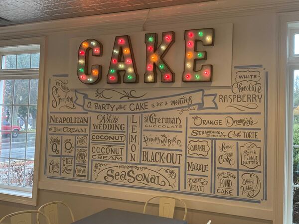 A sign celebrates the specialty at Blue Rooster Bake Shop and Eatery. Ligaya Figueras/ligaya.figueras@ajc.com
