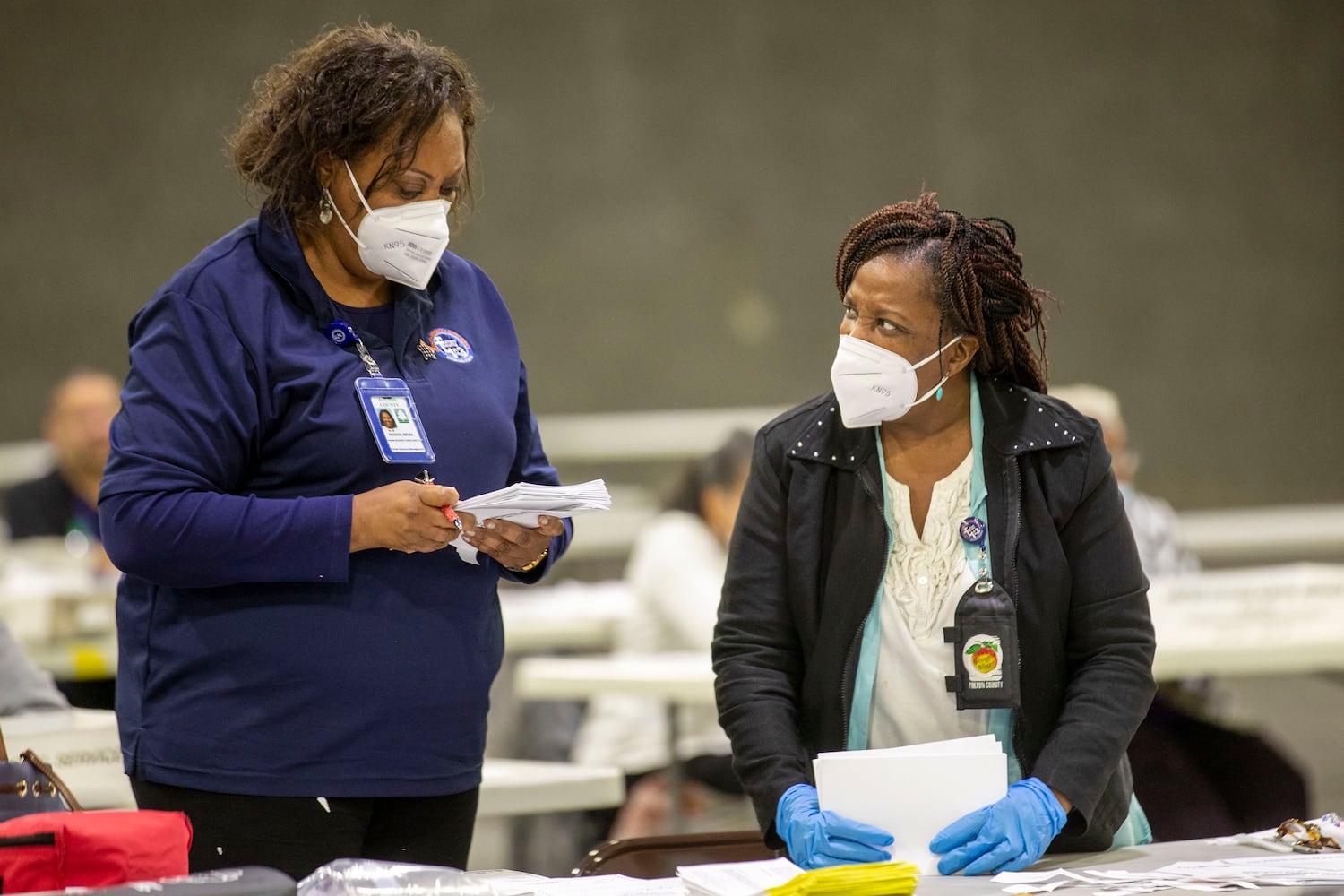 PHOTOS: Georgia voters struggle with long lines, new equipment, social distancing