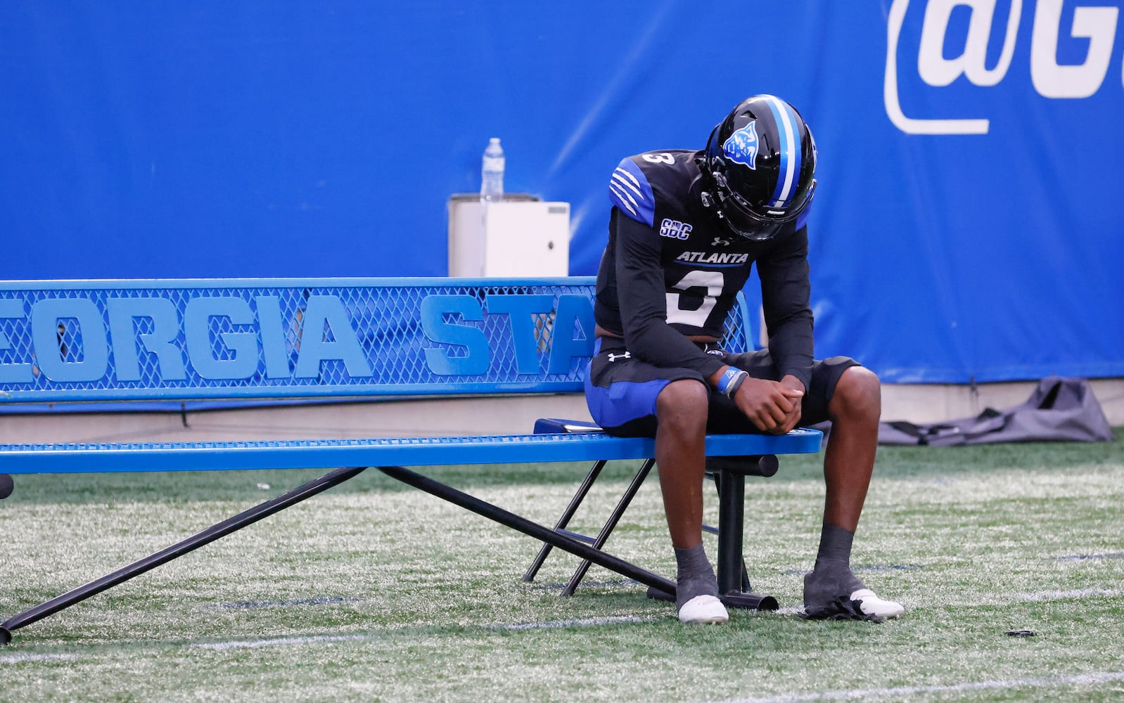 Georgia State Panthers quarterback Darren Grainger (3) sits alone on the bench following his team's 31-28 loss to Louisiana-Monroe at Center Parc Stadium in Atlanta on Saturday, Nov. 12, 2022. (Bob Andres for the Atlanta Journal Constitution)