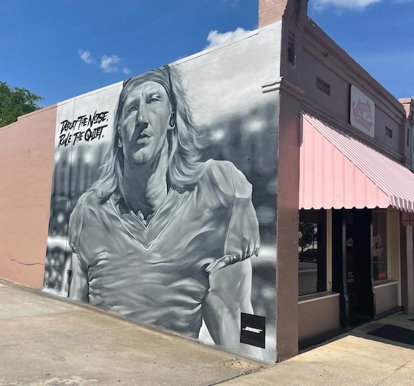 Trevor Lawrence, selected first overall in the NFL draft on April 29, 2021, was depicted in a mural in downtown Cartersville, Ga., his hometown. The mural was to be painted in the colors of the Jacksonville Jaguars, who selected Lawrence, once the selection was official. Speaker and headphone maker Bose commissioned the mural as a marketing device. (Photo courtesy Abbey Ross)