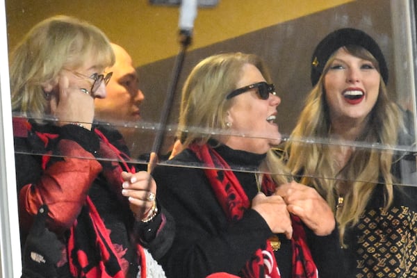 Donna Kelce, Andrea Swift and Taylor Swift, from left, watch play between the Kansas City Chiefs and the Buffalo Bills during the first half of the AFC Championship NFL football game, Sunday, Jan. 26, 2025, in Kansas City, Mo. (AP Photo/Reed Hoffmann)