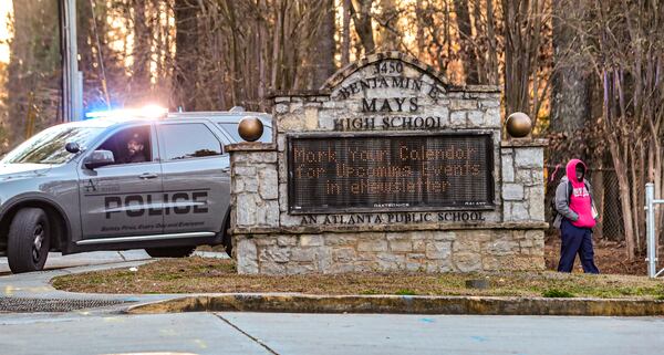 The morning after four students were shot at Benjamin E. Mays High in Atlanta, their classmates returned to school Thursday, Feb. 15, 2024 amid increased security. (John Spink / John.Spink@ajc.com)

