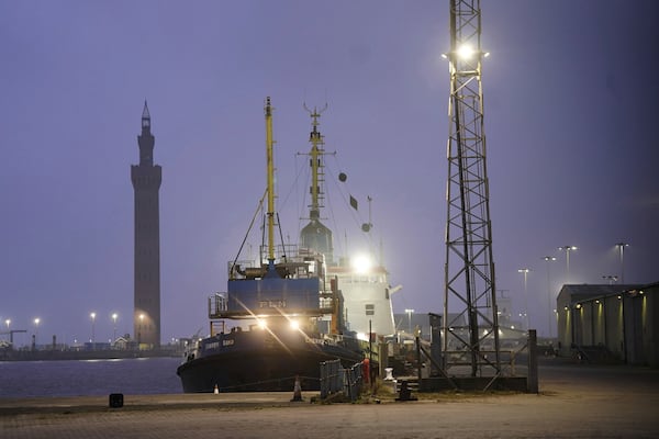 A view of Grimsby Docks, Grimsby, north east England, Monday March 10, 2025, after a cargo ship hit a tanker carrying jet fuel for the U.S. military, setting both vessels on fire and sending fuel pouring into the North Sea. (Danny Lawson/PA via AP)