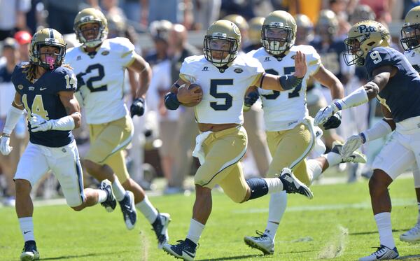 October 17, 2015 Atlanta - Georgia Tech Yellow Jackets quarterback Justin Thomas (5) runs as Pittsburgh Panthers defensive back Jordan Whitehead (9) pursues in the first half at Bobby Dodd Stadium on Saturday, October 17, 2015. HYOSUB SHIN / HSHIN@AJC.COMt34