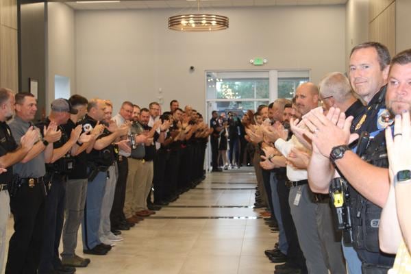 Cobb Police officers lined the entryway to the Cobb Police Training Center for 10-year-old Arya Patel, the department’s newest member through Make-A-Wish Georgia. (Photo Courtesy of Jake Busch)