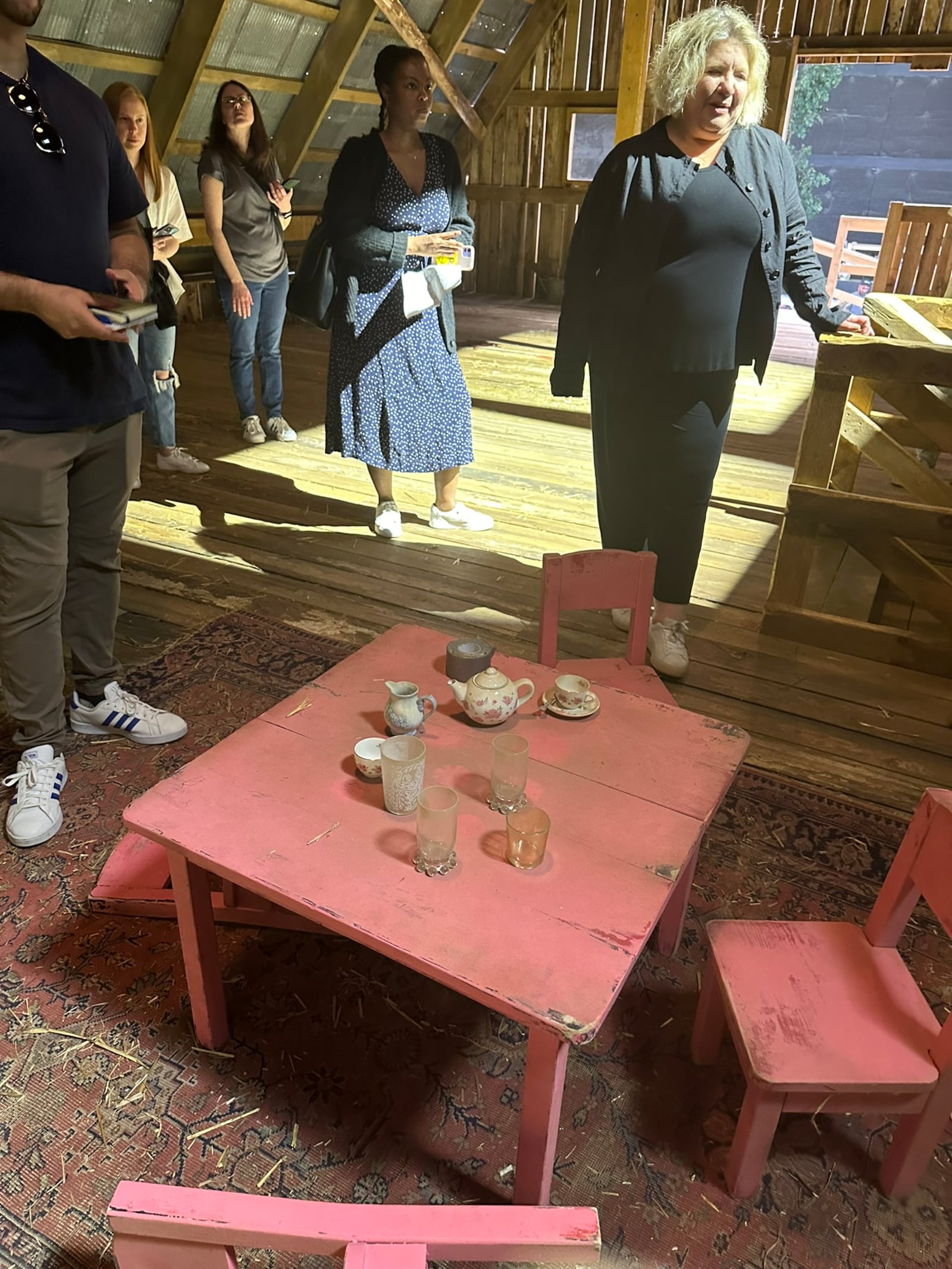 "Teacup" designer Patti Podesta provides journalists a tour of the set at Assembly Studios on May 22, 2024. RODNEY HO/rho@ajc.com