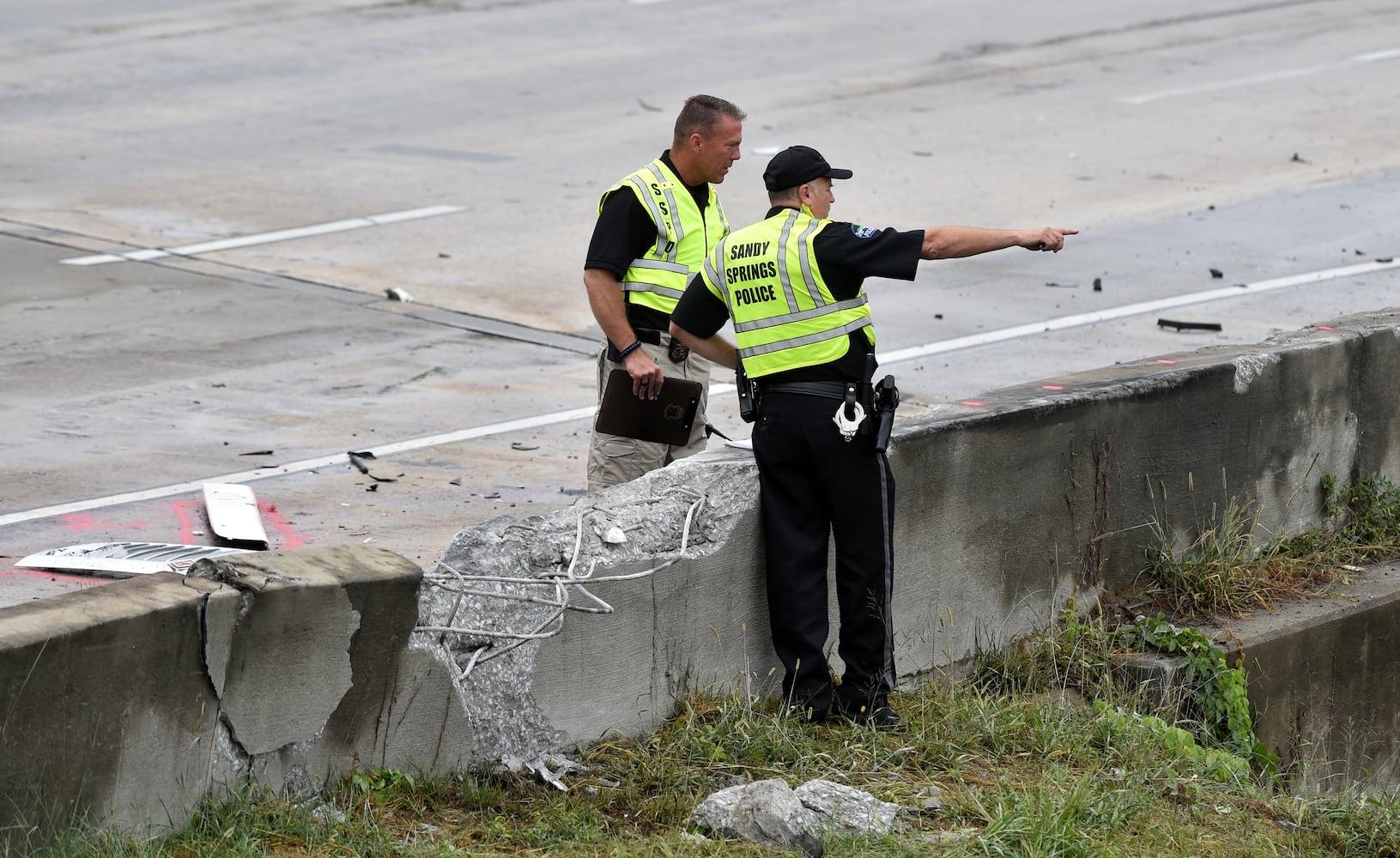 I-285 crash: Trucks plunge off interstate onto Ga. 400