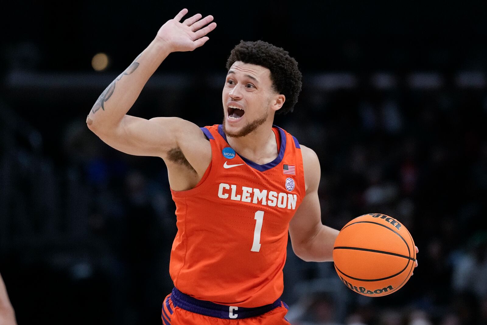 FILE - Clemson guard Chase Hunter (1) dribbles during the first half of an Elite 8 college basketball game against Alabama in the NCAA tournament, March 30, 2024, in Los Angeles. (AP Photo/Ashley Landis, File)