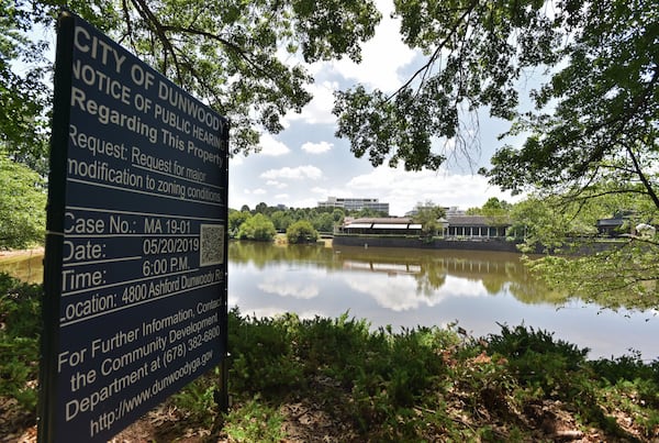 The city of Dunwoody put up public notice signs around the property earlier this year. (Photo: HYOSUB SHIN / HSHIN@AJC.COM)