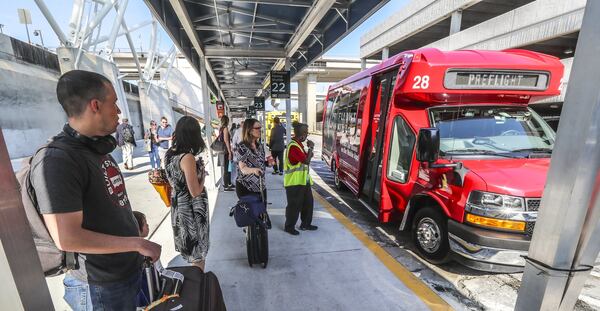 Aug 12, 2019 Hartsfield-Jackson International Airport : The worldâ€™s busiest airport moved off-airport parking shuttle pick-ups at the domestic terminal to the Terminal North lower level on Monday Aug. 12. Previously, those shuttles line up in designated spaces along an aisle of the ground transportation center outside the airportâ€™s west exit door. But there are major construction projects planned in that area, include an extension of the Plane Train tunnel and improvements to the West curb area. Monday, airport officials advised passengers taking off-airport parking shuttles to go to Terminal North escalators down to the lower level and exit through door LN1. Airport officials say signs and customer service representatives in bright green jackets will direct passengers. There will be no change for shuttle drop-offs, which will continue to be at the outer curb on the upper level of Terminal North. Regional shared-ride shuttle pick-ups will also be relocated effective Monday Aug. 12. The regional shared-ride shuttle pick-up area will take the place of the off-airport parking shuttles, behind the hotel shuttle aisle. Airport officials plan to later announce more changes for shuttle locations this fall. JOHN SPINK/JSPINK@AJC.COM