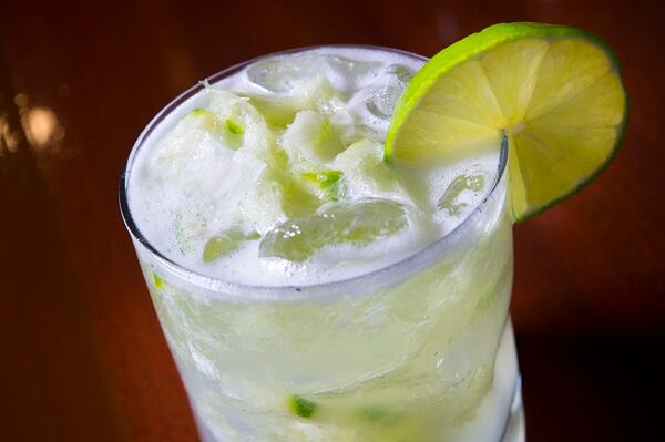 Edson Ludwig makes a caipirinha cocktail at Porto do Sul, a Brazilian restaurant in Overland Park. (Tammy Ljungblad/Kansas City Star/TNS)