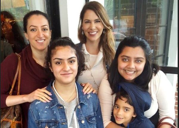 Ghadir Taher (top left) with her Atlanta friend Mary Trachian-Bradley (center) Birva Hansalia (right), her sister Saley Talabani (bottom left), and Mary's son Gabriel.