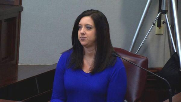 Amy Baygents, whose husband Michael is the brother of Justin Ross Harris, testifies at Harris' murder trial at the Glynn County Courthouse in Brunswick, Ga., on Tuesday, Nov. 1, 2016. (screen capture via WSB-TV)