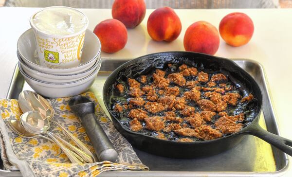 In "The Duke's Mayonnaise Cookbook" (Grand Central Publishing, $28), Georgia native Ashley Strickland Freeman crafts a summer crisp from peaches and blackberries. "So many fruits would work in place of the peaches and blackberries here if they're in season," Freeman writes. "You can also use thawed frozen fruit if you'd like." We chose peaches and blueberries. Duke's mayo is used to bind the brown sugar-oatmeal topping. STYLING BY WENDELL BROCK / CONTRIBUTED BY CHRIS HUNT PHOTOGRAPHY