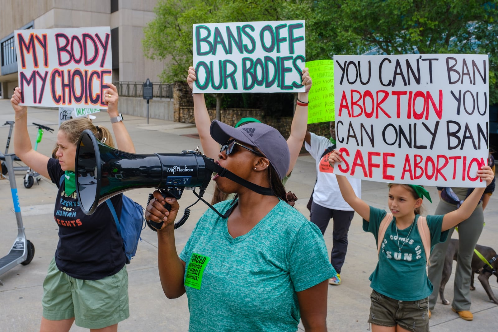 Abortion rights activist Kay (declined to provide last name) leads a protest in Atlanta on Thursday, July 21, 2022. The previous day a federal appeals court allowed Georgia’s restrictive “heartbeat” abortion law to take effect. (Arvin Temkar / arvin.temkar@ajc.com)