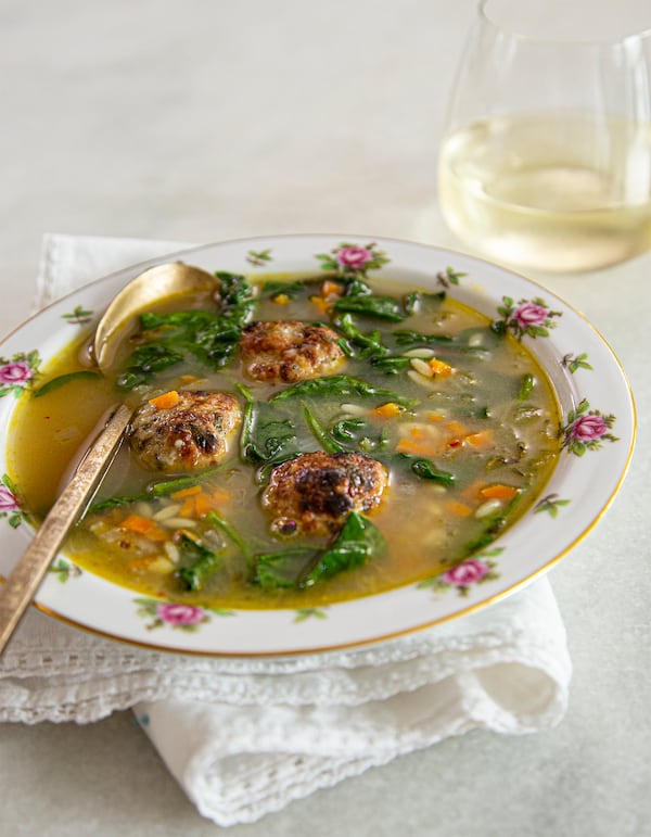 You can add some warmth to winter days with Italian Wedding Soup, adapted from a recipe in “Hot Little Suppers” by Carrie Morey (Harper Horizon, $34.99). (Courtesy of Angie Mosier)