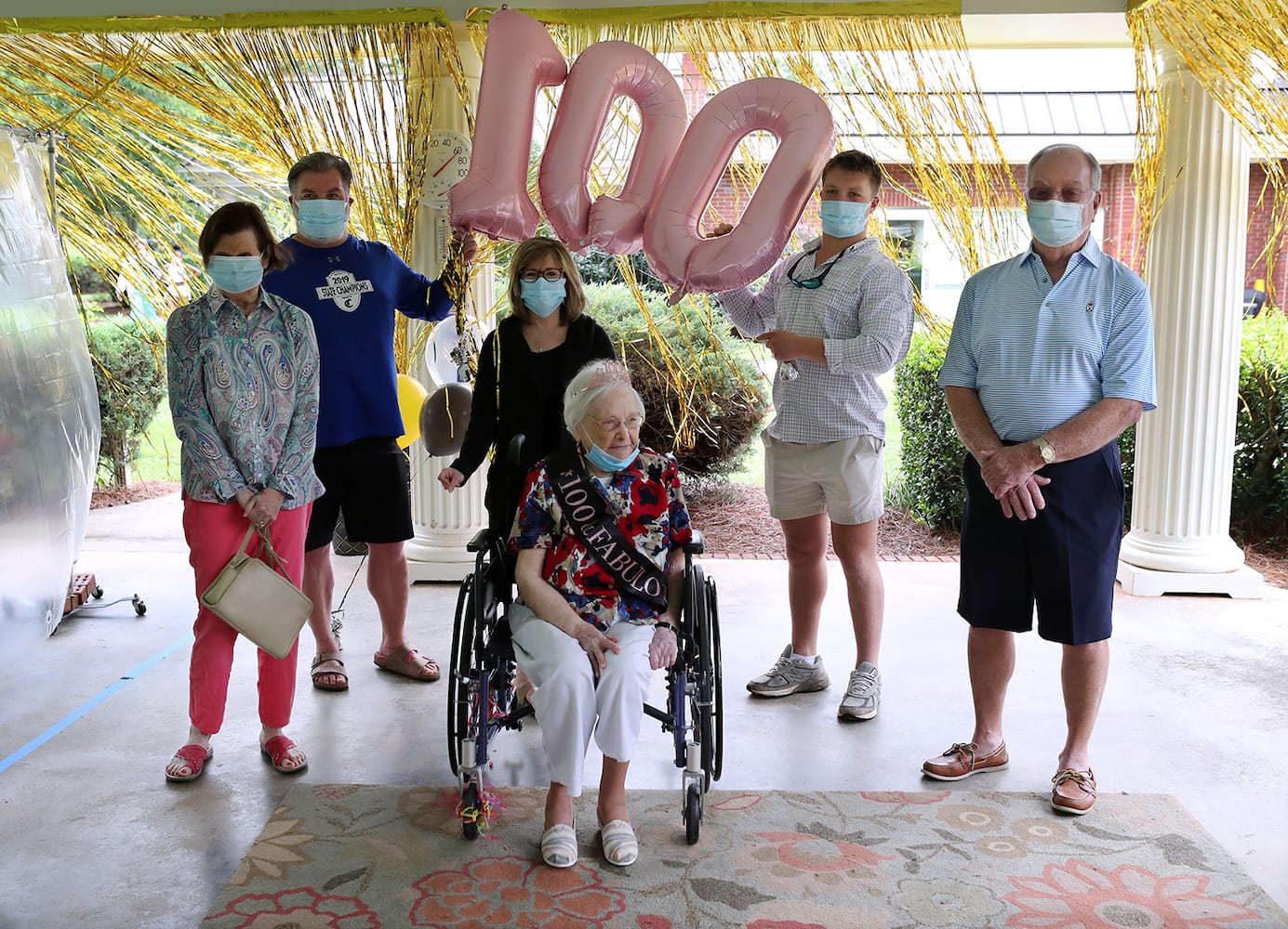 Photos: COVID-19 survivor celebrates 100th birthday