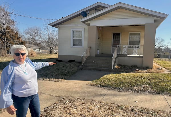 Sylvia Carvell describes her mother's childhood home in Murphysboro that was rebuilt to match the one destroyed in the March 18, 1925 Tri-State Tornado on March 11, 2025 in Murphysboro, Ill. (AP Photo/John O'Connor)