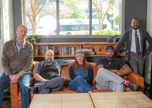 West Egg Cafe owners and longtime staff pose at the restaurant, which will close Dec. 29 after 20 years. From left: Ben Johnson (co-owner), chef Andrew Smith, Jennifer Johnson (co-owner), Dondre Johnson and Justin Gleaton. (Aaliyah Man for The Atlanta Journal-Constitution)