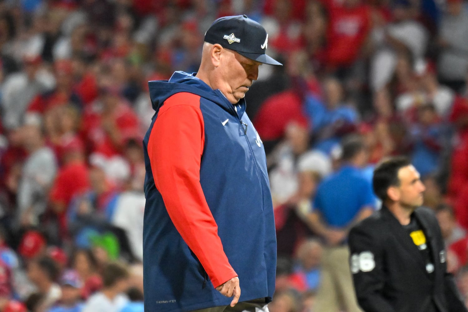 Atlanta Braves manager Brian Snitker exits the field after a pitching change during the eighth inning of NLDS Game 4 against the Philadelphia Phillies at Citizens Bank Park in Philadelphia on Thursday, Oct. 12, 2023.   (Hyosub Shin / Hyosub.Shin@ajc.com)