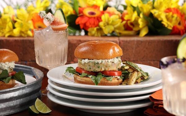 Crispy shrimp burgers with a spicy homemade mayonnaise are inspired by a midday feast while traveling in London. They make an indulgent departure from your usual burger for Labor Day. (Food styling by Mark Graham) (Abel Uribe/Chicago Tribune/TNS)