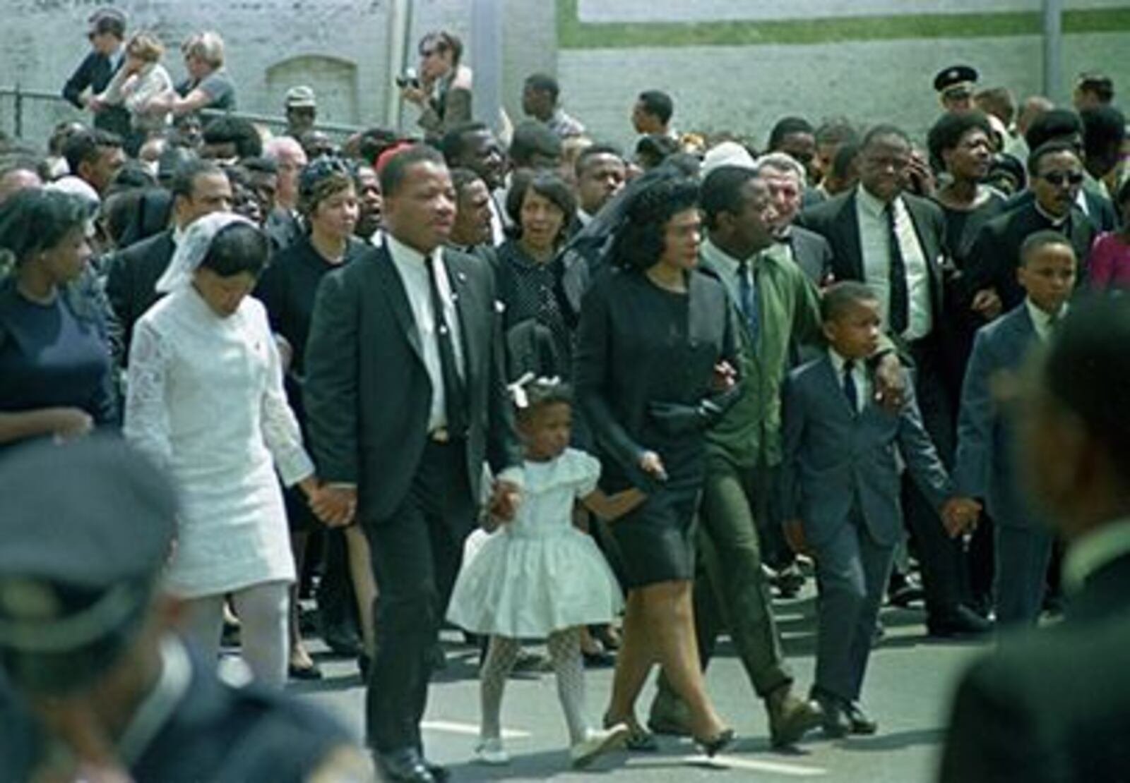 Coretta Scott King, center, widow of slain civil right Dr. Martin Luther King, Jr. walk in the funeral procession with their children and family in Atlanta, Ga., April 9, 1968. From left are, daughter Yolanda, 12; King's brother A.D. King; daughter Bernice, 5; widow King; Rev. Ralph Abernathy; sons Dexter, 7, and Martin Luther King III, 10.