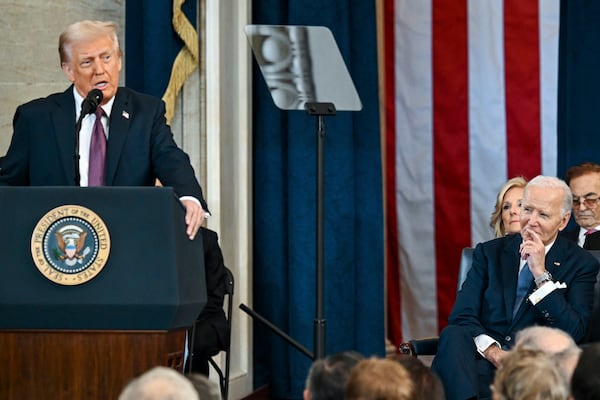 Former President Joe Biden (right) watches as President Donald Trump speaks after taking the oath of office at the 60th Presidential Inauguration in the Rotunda of the U.S. Capitol in Washington, D.C, on Monday, Jan. 20, 2025. (Kenny Holston/AP Pool)