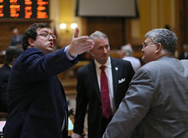 Georgia GOP Chair Josh McKoon, left, has refused to remove the names of businessman Perry Johnson and U.S. Sen. Tim Scott from the party's March 12 presidential primary ballot. The two candidates have suspended their campaigns but have not officially ended them, and McKoon said the state party's executive committee voted not to remove their names from the ballot. McKoon added that he doesn't have the authority to remove their names. BOB ANDRES / BANDRES@AJC.COM