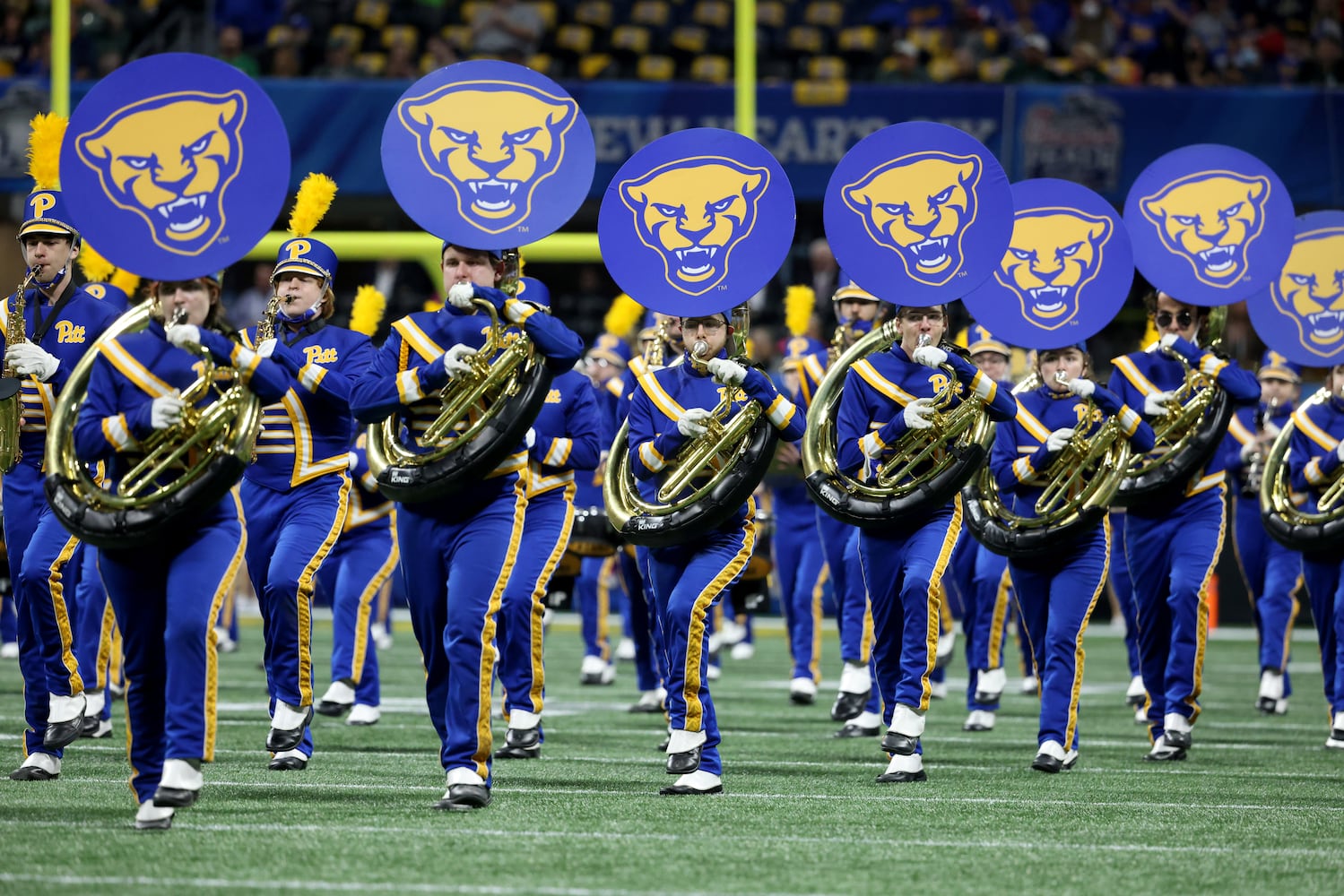 The Pittsburgh Panthers marching band perform before the Chick-fil-A Peach Bowl between the Pittsburgh Panthers and the Michigan State Spartans at Mercedes-Benz Stadium in Atlanta, Thursday, December 30, 2021. JASON GETZ FOR THE ATLANTA JOURNAL-CONSTITUTION