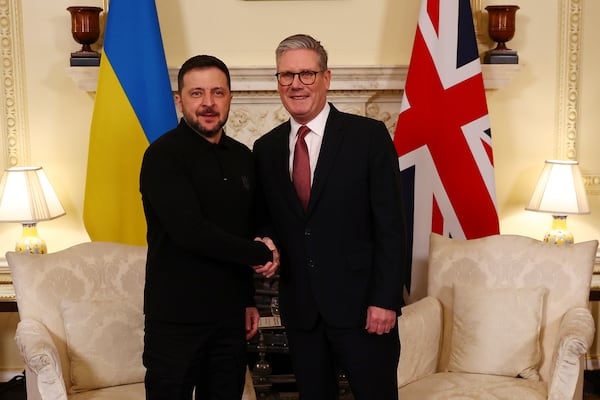 Britain's Prime Minister Keir Starmer, right, greets Ukraine's President Volodymyr Zelenskyy, left, for a meeting at 10 Downing Street in London, England, Saturday, March 1, 2025. (Peter Nicholls/Pool Photo via AP)