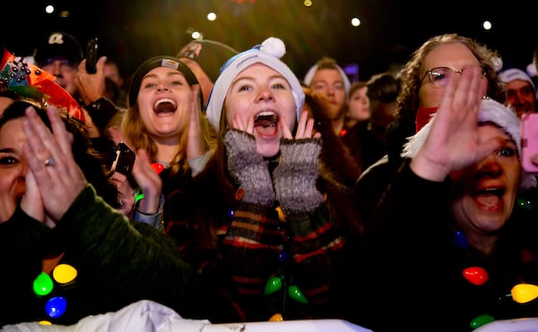 Melody Demerchant (C) cheers during the Macy's 72nd Great Tree Lighting Ceremony Sunday, November 24, 2019. STEVE SCHAEFER / SPECIAL TO THE AJC