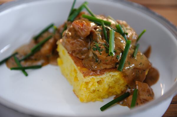 Barbecue shrimp with spoonbread, tomato, worcestershire and spice from W.H. Stiles Fish Camp. (Beckystein.com)