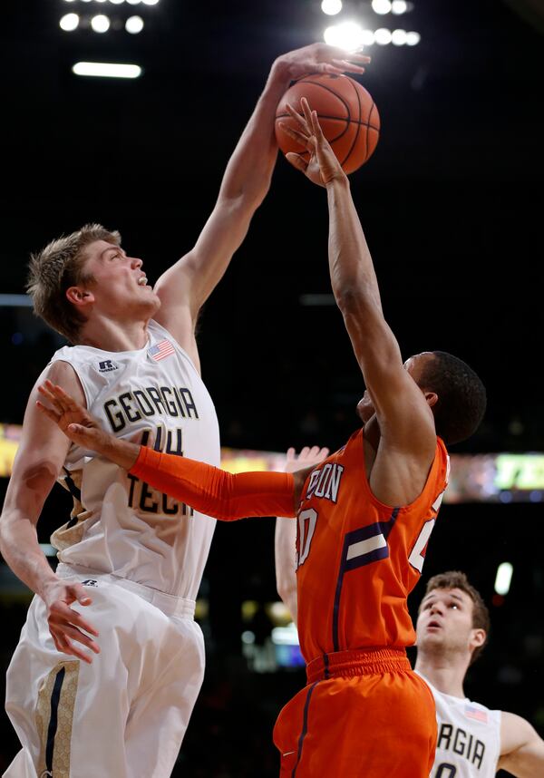 Clemson guard Jordan Roper (20) has his shot blocked by Georgia Tech center Ben Lammers (44) during the first half of an NCAA college basketball game Tuesday, Feb. 23, 2016, in Atlanta. Georgia Tech won 75-73. (AP Photo/John Bazemore)