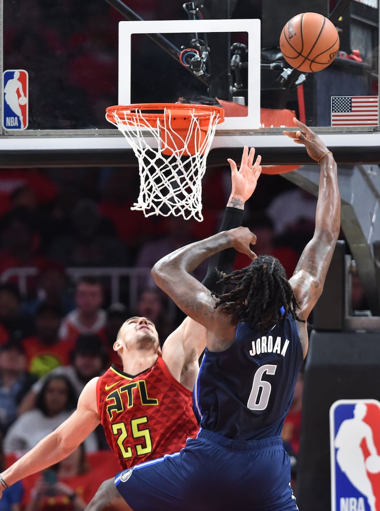 Photos: Hawks rally to beat Mavs in home opener