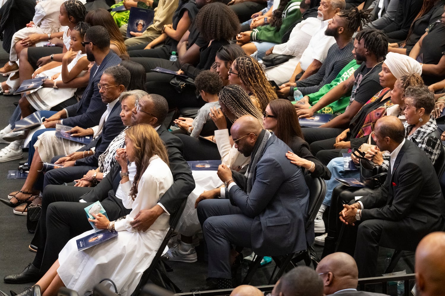 Family and friends become emotional during a celebration of life for former Kennesaw State University basketball coach Amir Abdur-Rahim at the KSU convocation center on Sunday, Oct. 27, 2024.   Ben Gray for the Atlanta Journal-Constitution