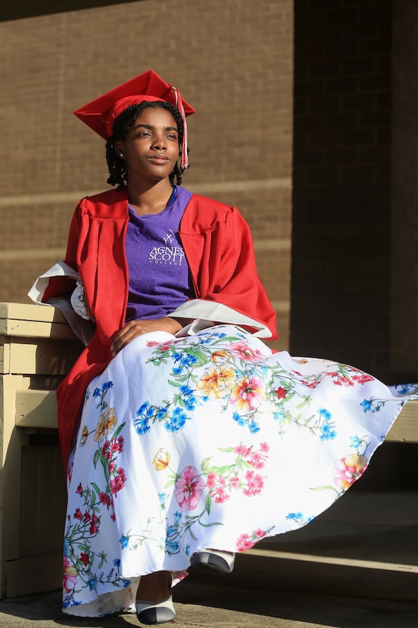 Hannah Savage poses for a portrait on Tuesday, June 16, 2020, at Whitewater High School in Fayetteville, Georgia. Thousands of K-12 schools and colleges closed in the middle of the spring semester this year due to the coronavirus pandemic. For high school and college seniors, the closure not only meant the end of in-person classes, but also no traditional senior rituals like prom and graduation. 