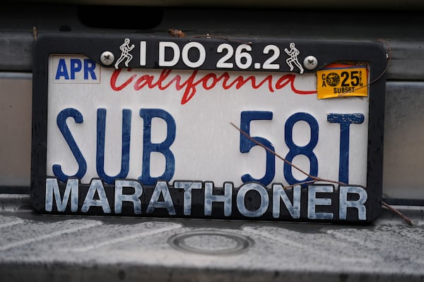 The license plate of Los Angeles Marathon participant Rick Bingham is shown in Lake Elsinore, Calif., Tuesday, March 11, 2025. (AP Photo/Damian Dovarganes)