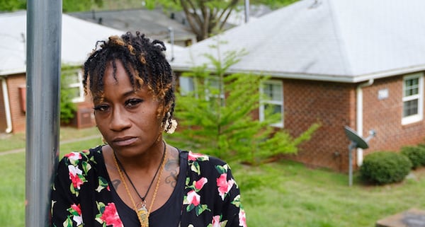 Miracle Fletcher poses for a portrait in front of Trestletree Apartments North in Atlanta on Wednesday, April 20, 2022.   (Arvin Temkar / arvin.temkar@ajc.com)