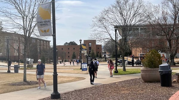 Kennesaw State University students walk to and from class on March 22, 2022. Georgia lawmakers passed HB 1, which would allow groups to speak in outdoor spaces on public college campuses. Eric Stirgus/eric.stirgus@ajc.com.