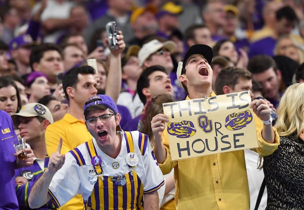 LSU fans cheer in the second half of the Chick-fil-A Peach Bowl at Mercedes-Benz Stadium on Saturday, December 28, 2019. LSU won 63-28 over Oklahoma. (Hyosub Shin / Hyosub.Shin@ajc.com)