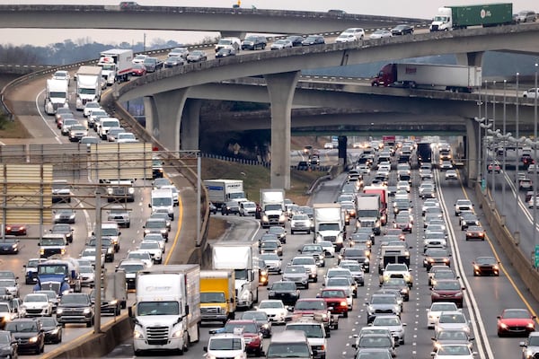 Traffic travels northbound on I-85 just past the I-285 overpass, also known as Spaghetti Junction, Monday, January 30, 2023, in Doraville, Ga.. Jason Getz / Jason.Getz@ajc.com)
