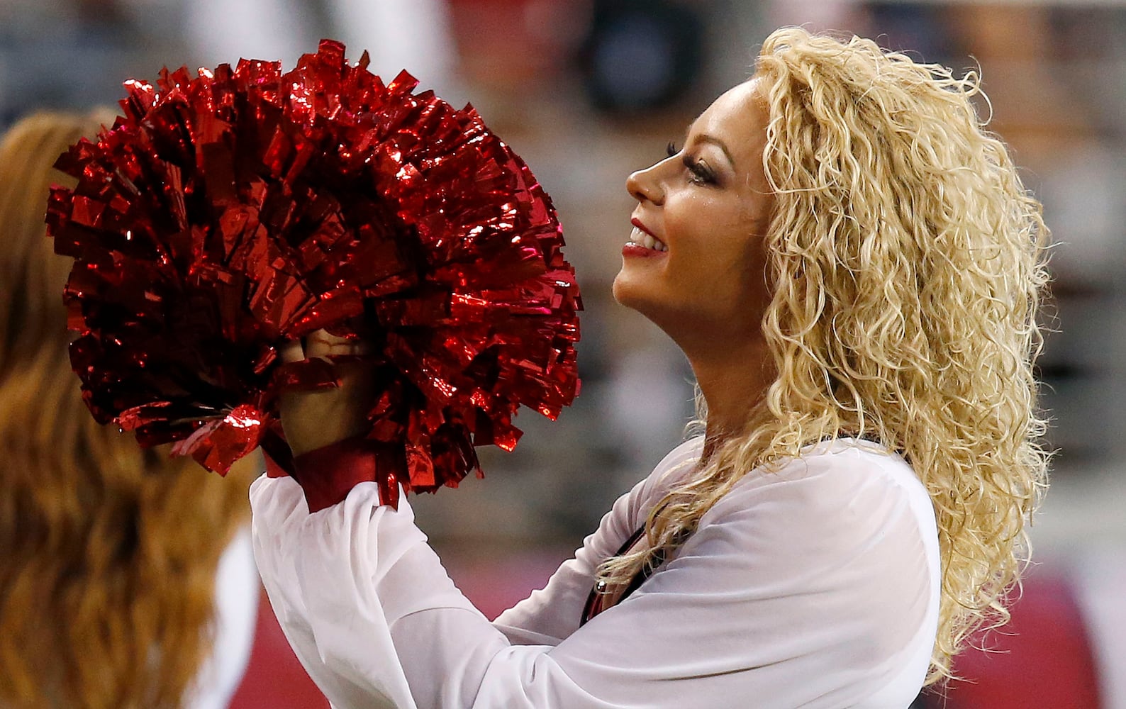 NFL cheerleaders perform at preseason games