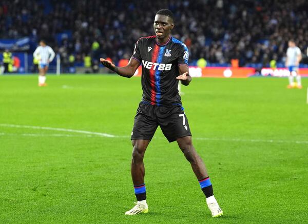 Crystal Palace's Ismaila Sarr celebrates scoring during the English Premier League soccer match between Brighton and Hove Albion and Crystal Palace, at the American Express Stadium, in Brighton and Hove, England, Sunday, Dec. 15, 2024. (Zac Goodwin/PA via AP)