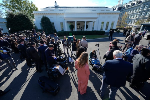 Members of the press gather outside the West Wing of the White House in Washington, Wednesday, Nov. 13, 2024, before President Joe Biden meets with President-elect Donald Trump in the Oval Office. (AP Photo/Susan Walsh)