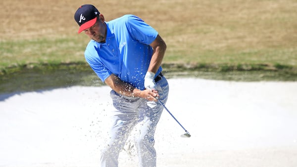 Former Braves pitcher John Smoltz hits out of the sand on the 18th green during the final round of the Champions TOUR Mitsubishi Electric Classic golf tournament Sunday, April 21, 2019 at the TPC Sugarloaf in Duluth.